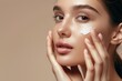 © AlgoVijo - Elegant Woman Applying Cream to Cheek Highlighting Natural Beauty