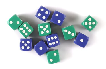 Blue and green gambling dices, macro isolated on white background, top view