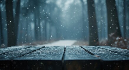 Poster - A serene forest scene with snowflakes falling on a wooden surface, creating a tranquil atmosphere.