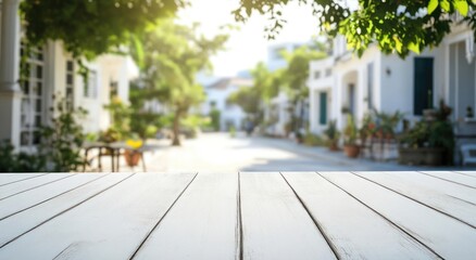 Canvas Print - A serene outdoor scene featuring a blurred street with a wooden table in the foreground.