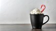 © Mary - Hot Chocolate with Whipped Cream and Candy Cane in Black Mug