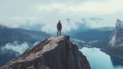 hike to husfjellet peak in norway and conquer the mountain cliff summit to experience adventure, out