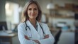 © willian - Confident Female Doctor in White Coat with Stethoscope