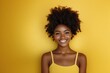 © Tuyres - Smiling Woman with Natural Hair and Yellow Background, Generative AI.