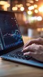 © wudu_8 - A close-up of a laptop displaying business charts shifting dramatically as election results roll in