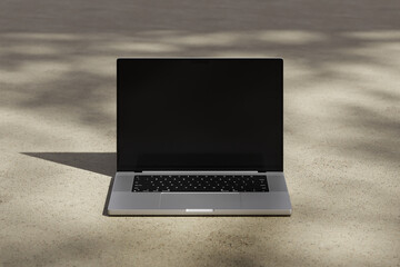 Wall Mural - opened macbook pro laptop with blank black screen