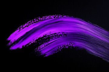 Wall Mural - bright purple brush stroke paint on black background