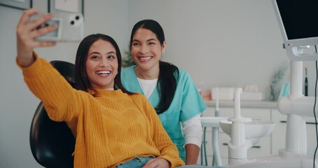 Wall Mural - Women, dentist and happy with patient on selfie at clinic on consultation for social media and profile picture. People, doctor and smile or excited for oral care, teeth whitening and dental procedure