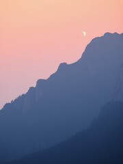 Sticker - Silhouetted mountains with a crescent moon in a pink sky.