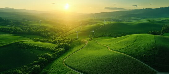 windmills in a green field, aerial view. copy space. green ecology landscape background