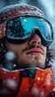 © marimalina - a man wearing goggles standing in the snow