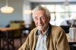 © CojanAI - Portrait of a smiling elderly man in nursing home during Christmas