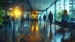 © Siasart - A modern office space with people walking and large windows, showcasing a professional environment.