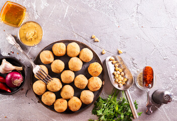 Poster - Falafel (Middle East): Deep-fried balls made from ground chickpeas mixed with herbs and spices.