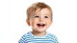 © Suphot - Cheerful baby with bright eyes and a joyful smile, wearing a striped shirt against a white background, capturing pure happiness.