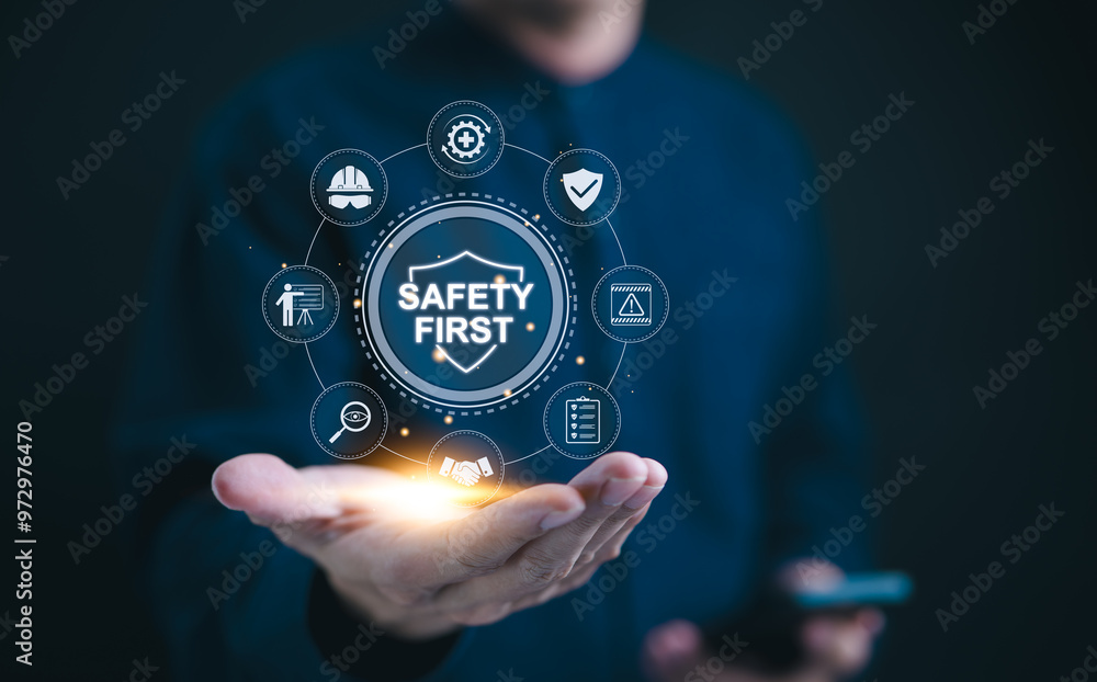 Safety first concept. Work safety compliance, A professional holds ...