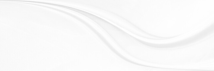 White gray satin texture that is white silver fabric silk panorama background with beautiful soft blur pattern natural.