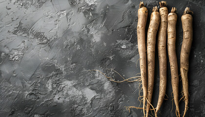 Canvas Print - Raw salsify roots on grey table, flat lay