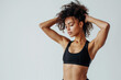 © kora studio - very strong muscular fit young woman in workout fashion outfit showing her strong muscles