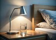 © Jason - Bedside lamp and water glass on wooden table