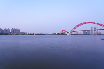 Wall Mural - Guangzhou Pearl River Red Bridge and Riverside City Tall Buildings