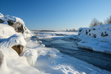 Sticker - A frozen river with ice on the rocks