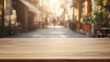 © BerkahStock - A blurred outdoor café scene with a wooden table in the foreground.