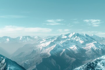 Canvas Print - Aerial view of a mountain range from a plane, suitable for travel or adventure uses