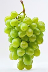 Wall Mural - A close-up shot of a bunch of green grapes, perfect for food or wine related concepts