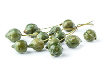 Canvas Print - A collection of green fruits sit on a white surface