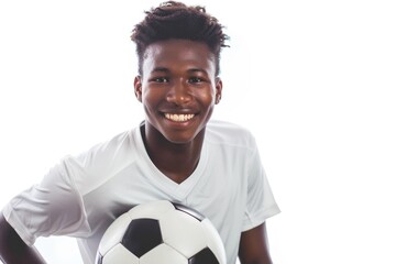 Wall Mural - A young man standing with a soccer ball on a white background, ready to play or take a photo