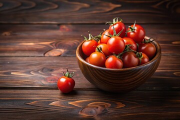 Close-up of brown bowl with cherry tomatoes on dark wooden background, selective focus