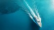 © PondLord - A sleek luxury yacht gliding through calm turquoise waters, showcasing its elegant lines and modern design