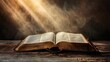© venusvi - Open book with a bright light emanating from it signifying belief Close-up photo with clean background