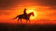 © BROPRADANA - Silhouette of a cowboy riding a horse through a field at sunset.