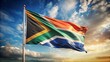 © Four888 - Vintage South African flag waving proudly in the wind, featuring a bold orange, white, and blue design, symbolizing national pride and heritage.