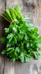 a bunch of fresh parsley leaves herb on a wooden surface