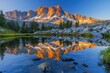 © nik_yurginson - Majestic rocky mountain peak reflecting in tranquil alpine waters at sunset
