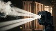 © Kartik - Vintage theater white light beam from projector on black background, illuminating smoke.Barn doors and grid used for light directing.