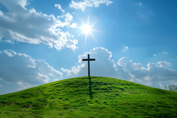 Wall Mural - Cross on a Green Hill with Bright Sky and Sunlight