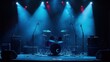 © B 7 YOU - A drum set sits on a stage with blue lights and fog.