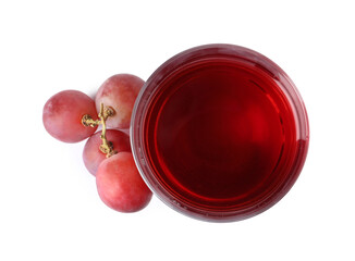 Wall Mural - Tasty juice in glass and fresh grapes isolated on white, top view