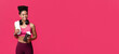 © Prostock-studio - Happy african fitness girl with towel on her shoulder and wireless headset holding bottle with protein, looking at copy space