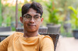 © wdnld - Thoughtful Young Man in Outdoor Setting