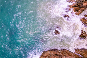 Top view waves crashing on sand, Sea texture background,Ocean in sunny summer day background