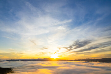 Amazing Sunrise or sunset over mountains hills covered with mist, Aerial view landscape drone shot beautiful colorful nature background