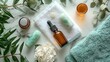 © A4719 - Spa Essentials Flat Lay with Green Stones  Towels  and Bottles