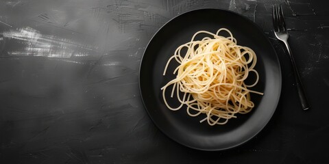 Dark plate with italian spaghetti on dark 