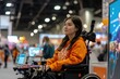 © SUPHANSA - A motorized wheelchair user attends a science fair, exploring innovative projects at various booths in a lively venue with excited students and interactive exhibits