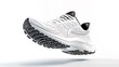 © Raitalinn - White athletic running shoes with black soles rest against a white background, their design sleek and practical.